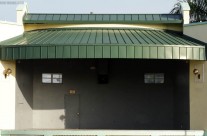 Tapered Standing Seam in Forest Green – Losner Park Stage, Homestead, FL